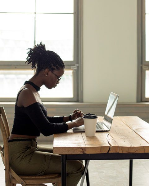 Female entrepreneur working on a computer