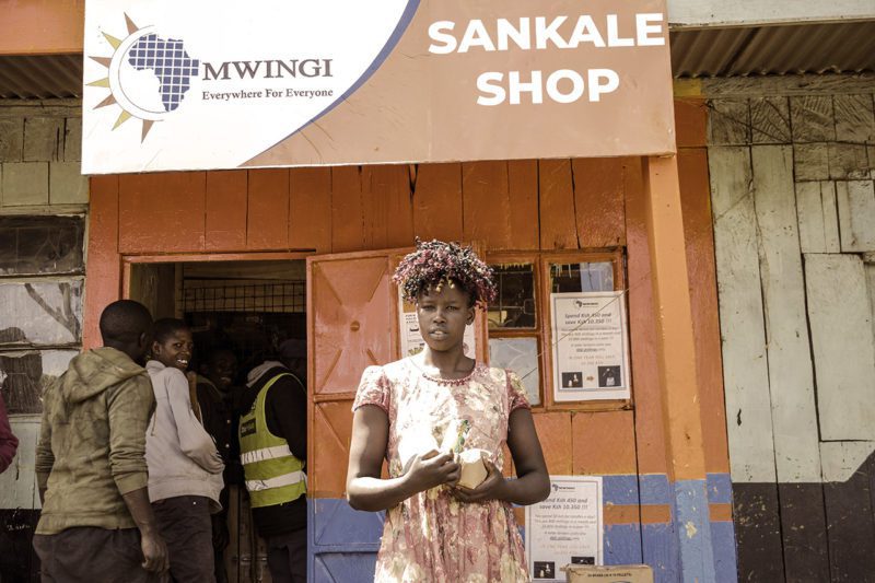 Woman in front of Sankale Shop