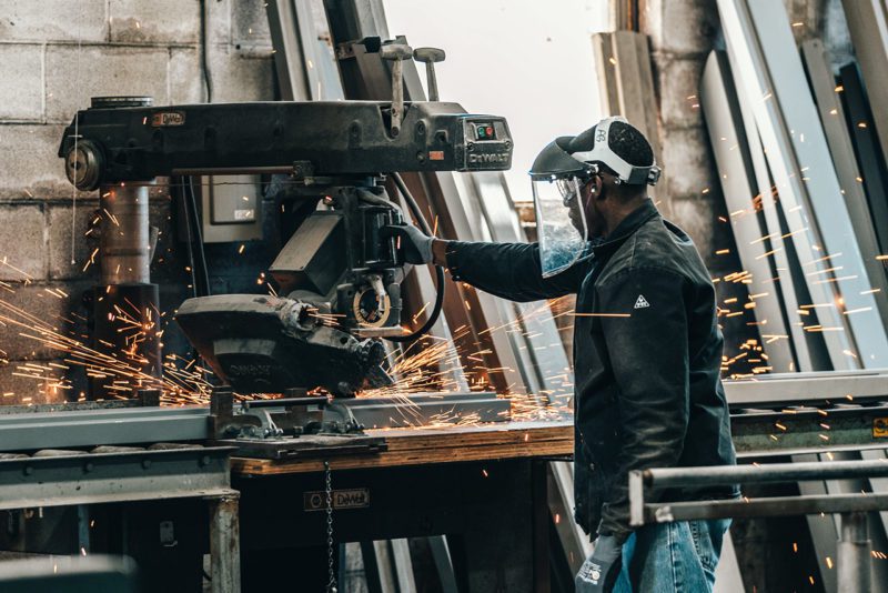 Worker using machinery