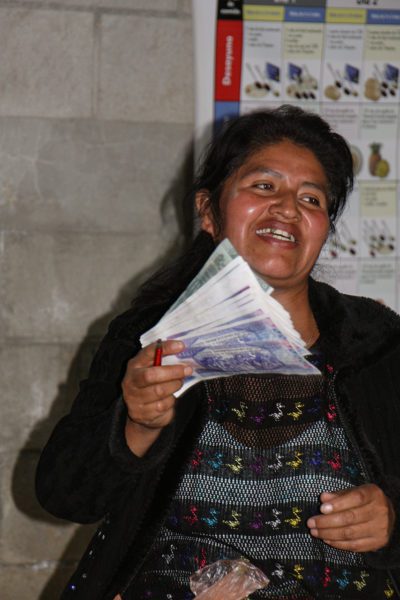 Woman holding currency