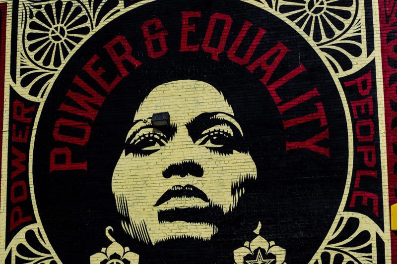 Equality mural art with woman's face