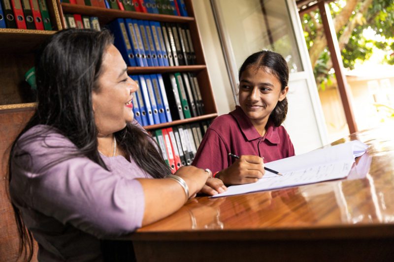 Guidance Counselor Manjula Shrestha works with a student at Kopila Valley School in Surkhet, Nepal.