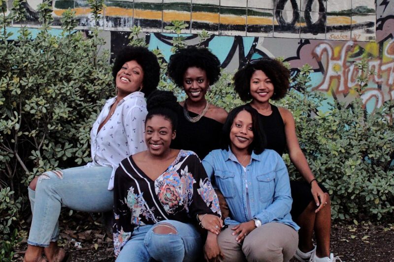 Black women smiling