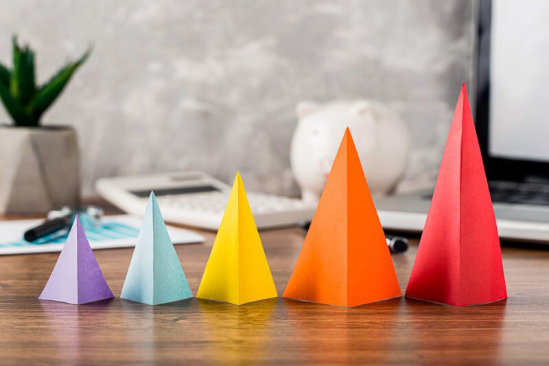 Colorful paper pyramids in ascending size