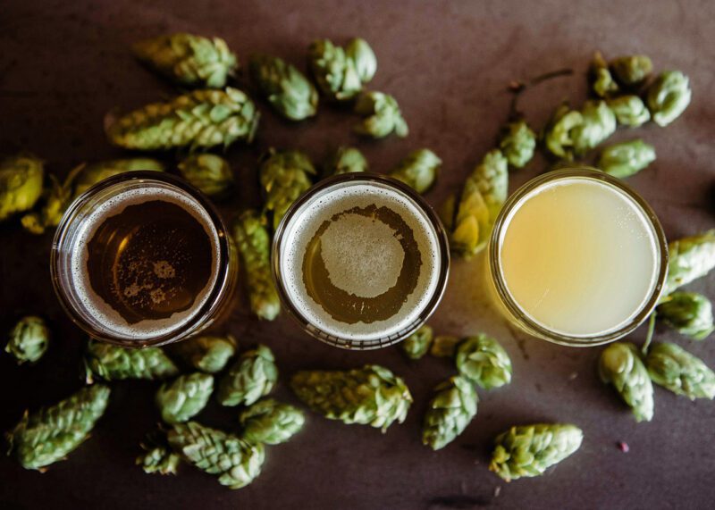Three glasses of beer seen from above