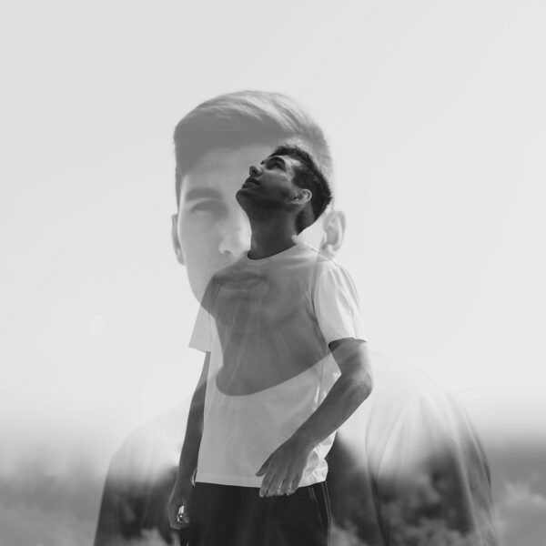 Double exposure of man