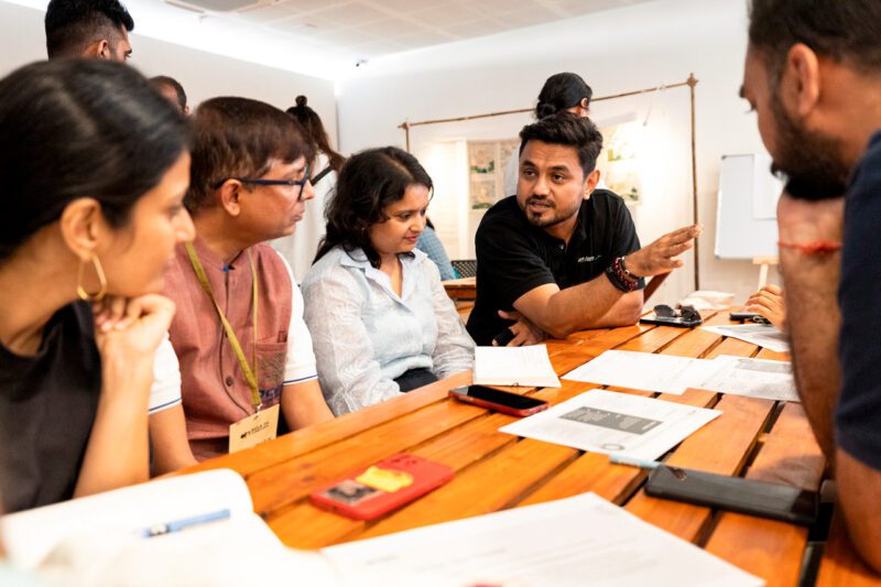Indian professionals at conference table