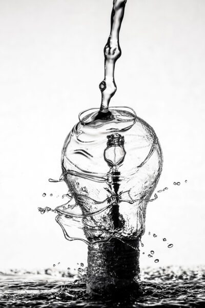 Water pouring onto lightbulb