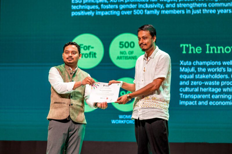 Two Indian professionals at award presentation